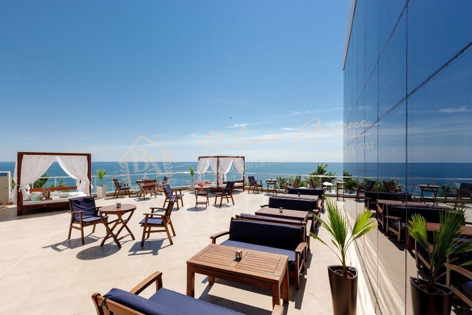 Two-bedroom, designer apartment with sea view on the first line in Byala