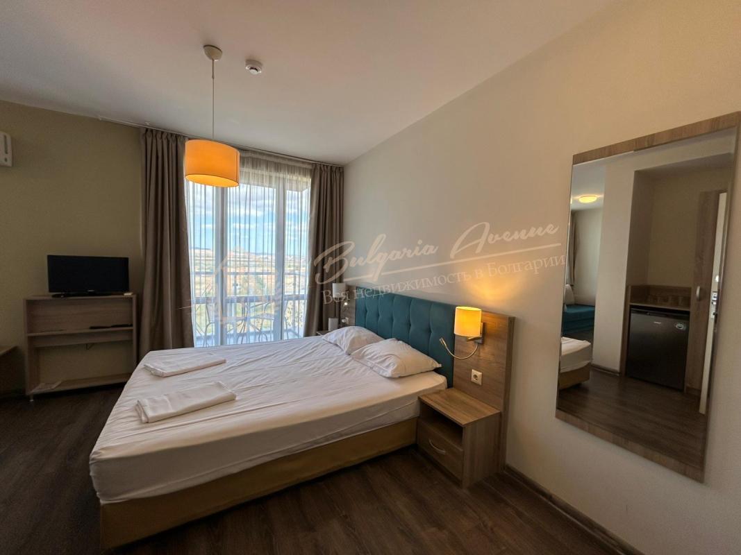Studio in the Tarsis apart-hotel with a beautiful view of the complex grounds